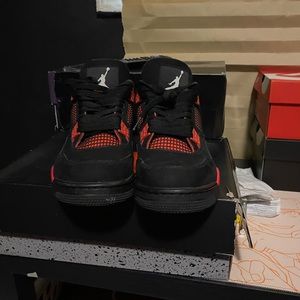 A pair of red thunder 4s